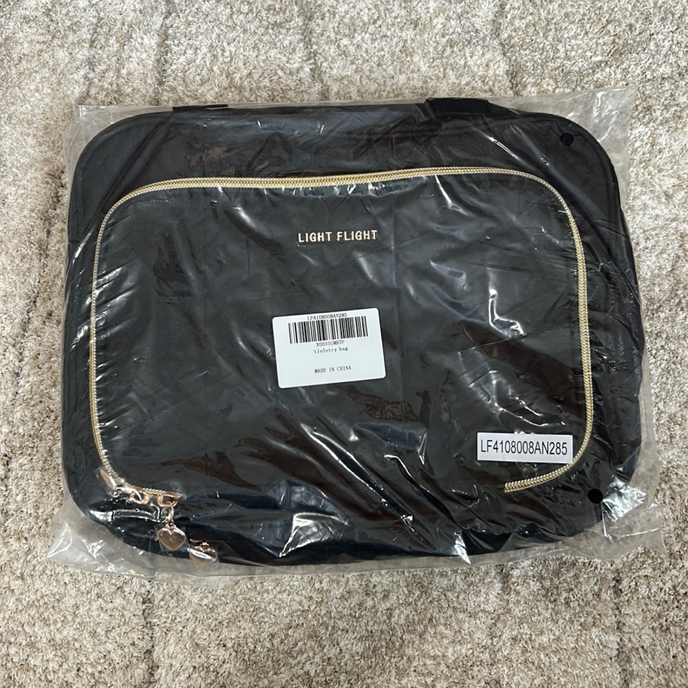 Black Light Flight Toiletry Bag - NWT